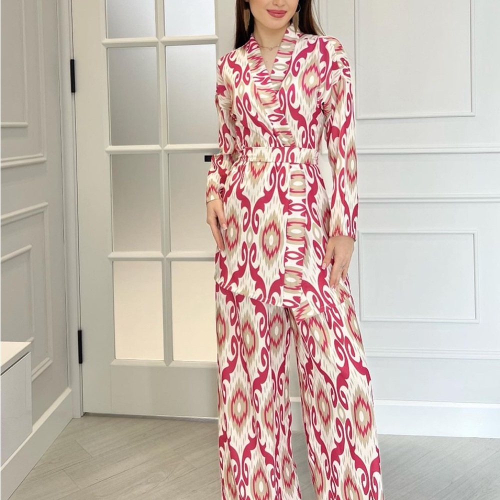 Ikat two piece belted top/blouse and pants set.